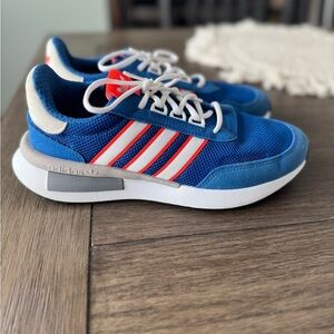 Adidas Blue, White, and Neon Orange Sneakers.